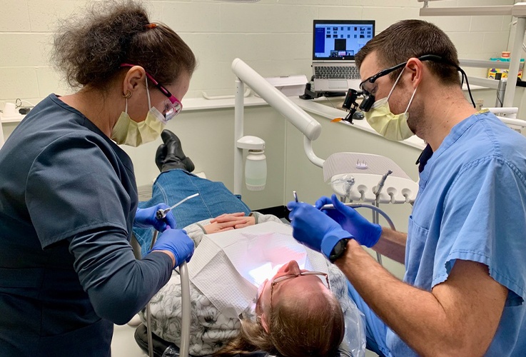 Dr. Springhetti caring for dental patient