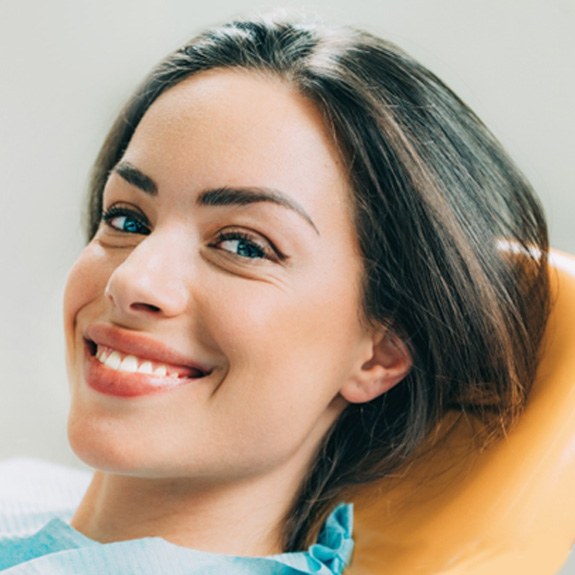 Close-up of a female dental patient smiling