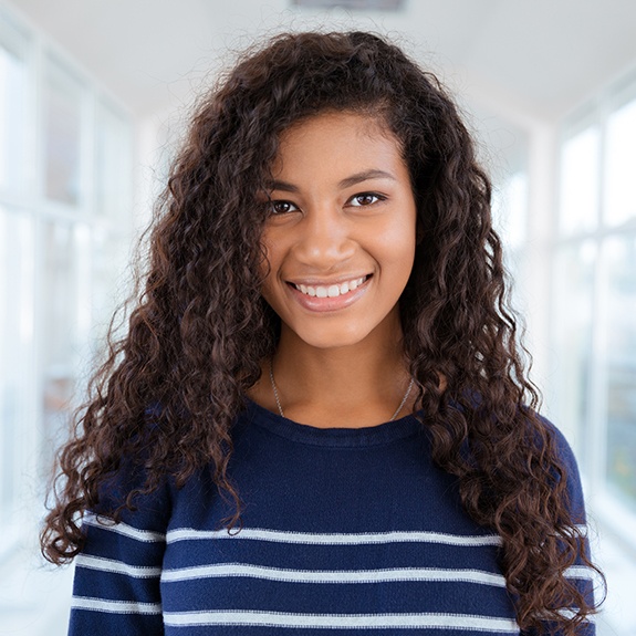 Young woman sharing healthy smile
