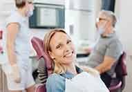 Woman smiling in the dental chair