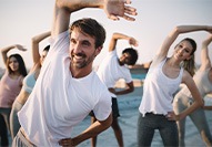 people doing yoga outdoors