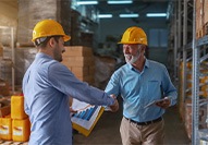 Dentures patient in Carmel shaking hands with a client